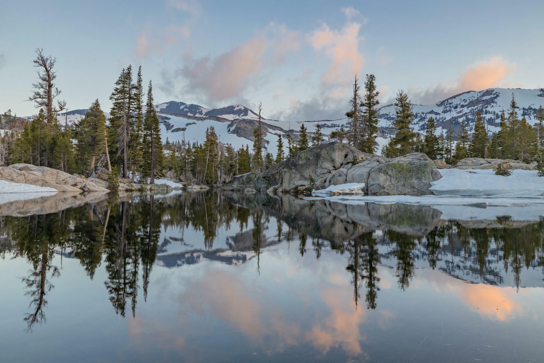 Alpine lake at sunrise.