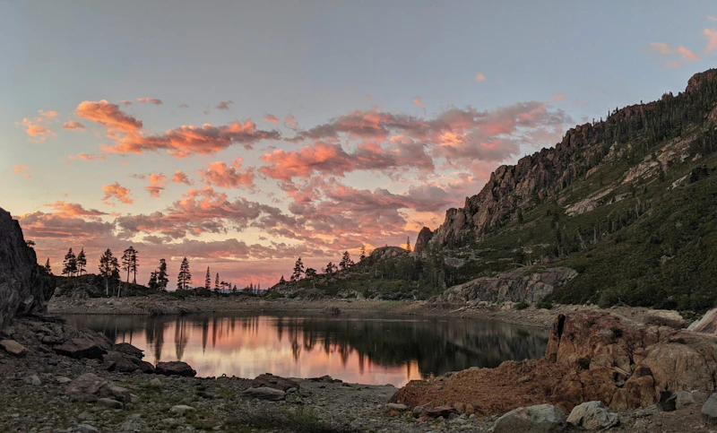 Sunset over an alpine lake.