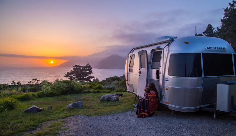RV camping along the shore.