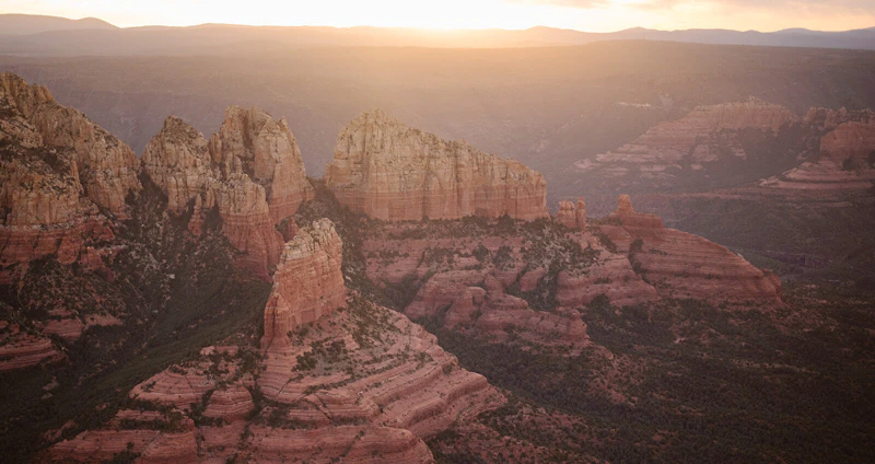 Rock formations rise out of a deep canyon.