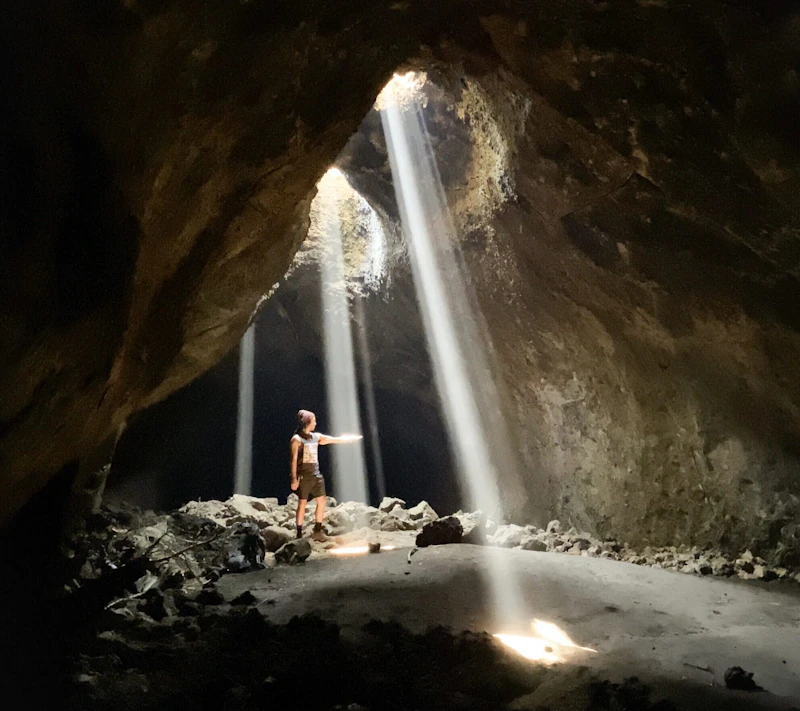 Light shines into a cave.