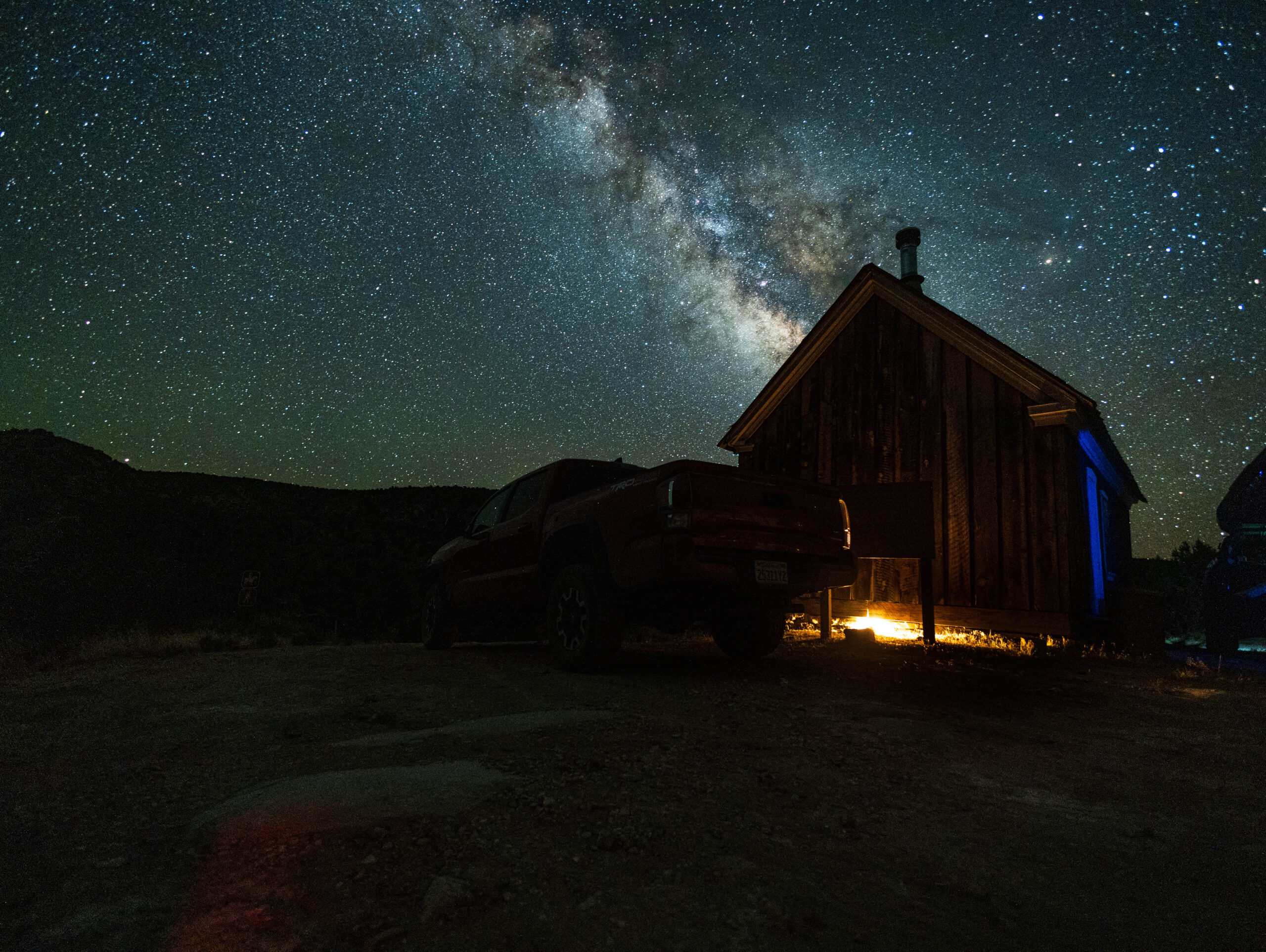 Historic cabin under the Milky Way.
