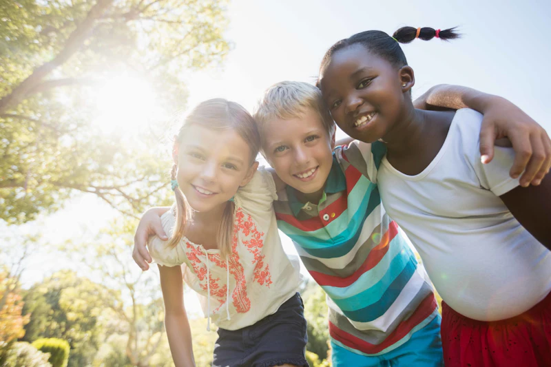 Kids In Sunny Forest Istock