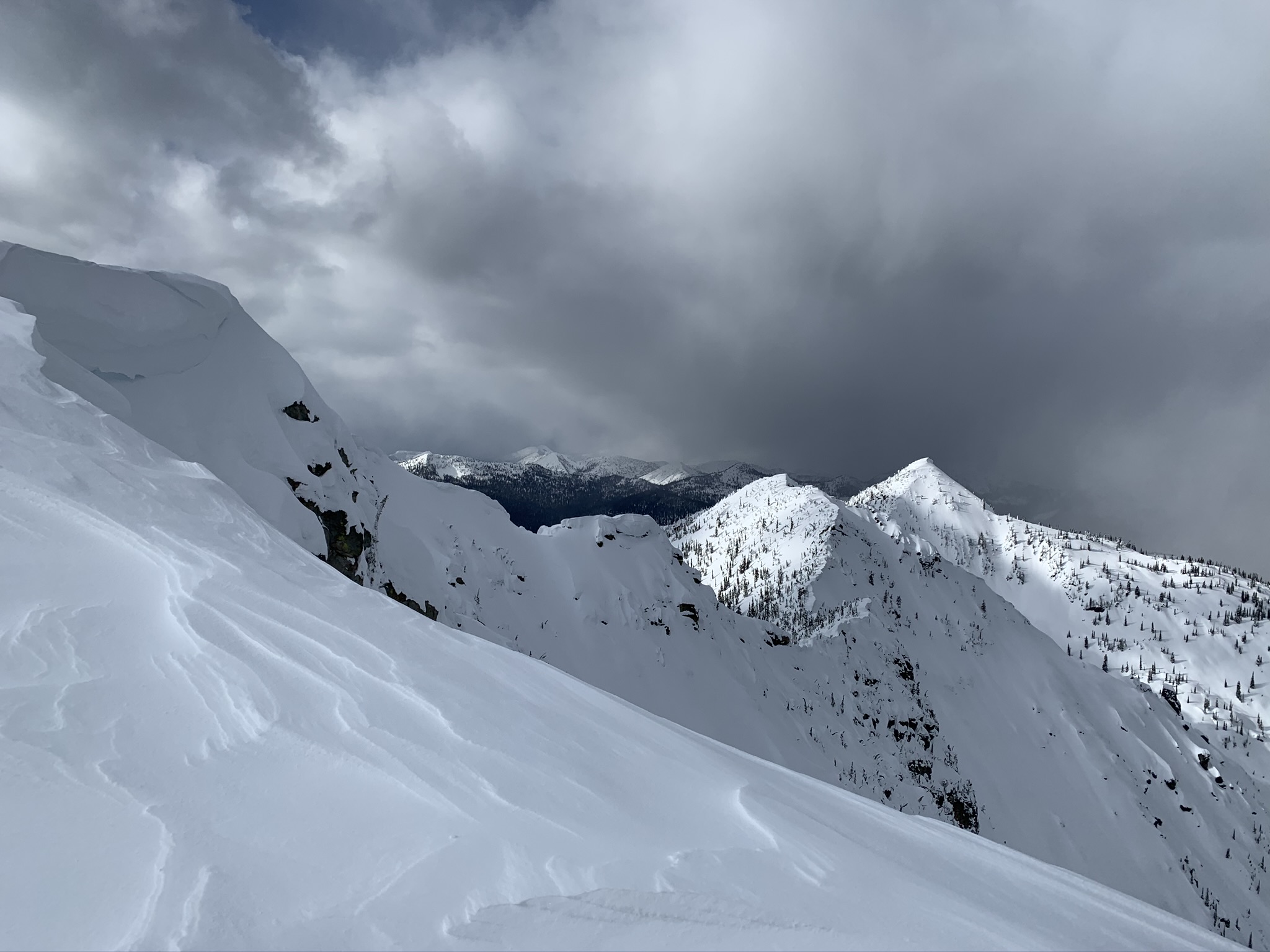 Looking north across the Canadian border from the summit of Snowy Top Mountain in winter on the Idaho Panhandle National Forests.