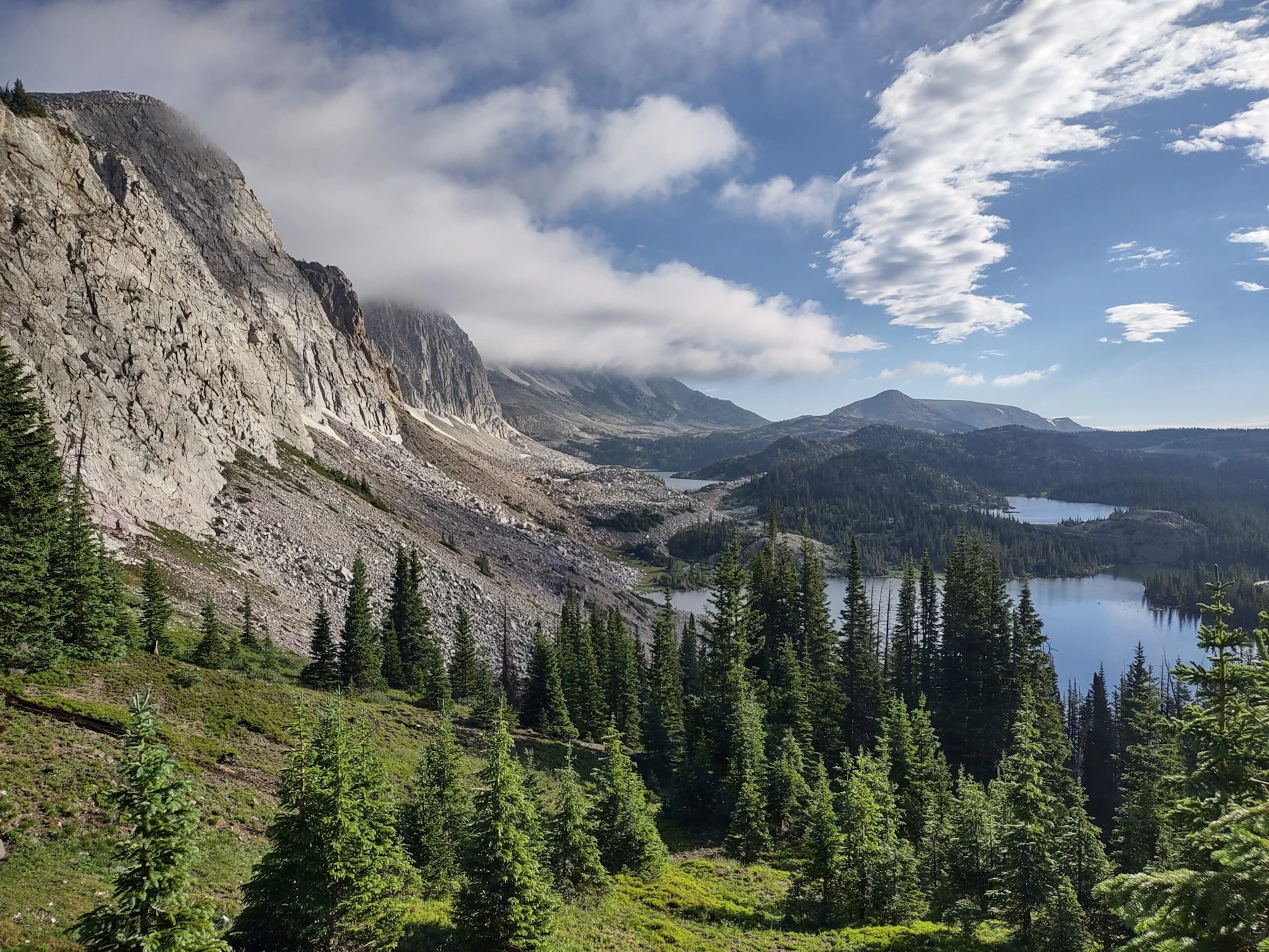 Mountain rises above an alpine lake.