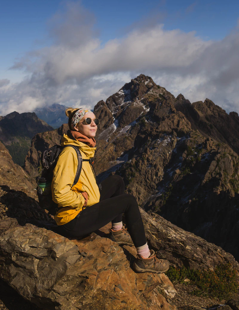 Woman on the summit of Mount Ellinor.