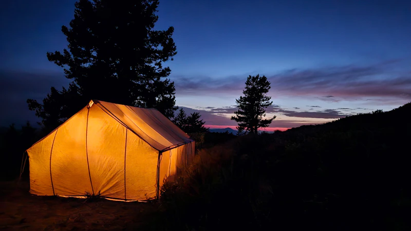 Glowing tent after sunset.