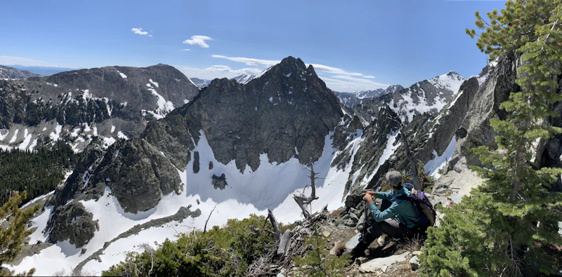 Hiker enjoying a mountain view.