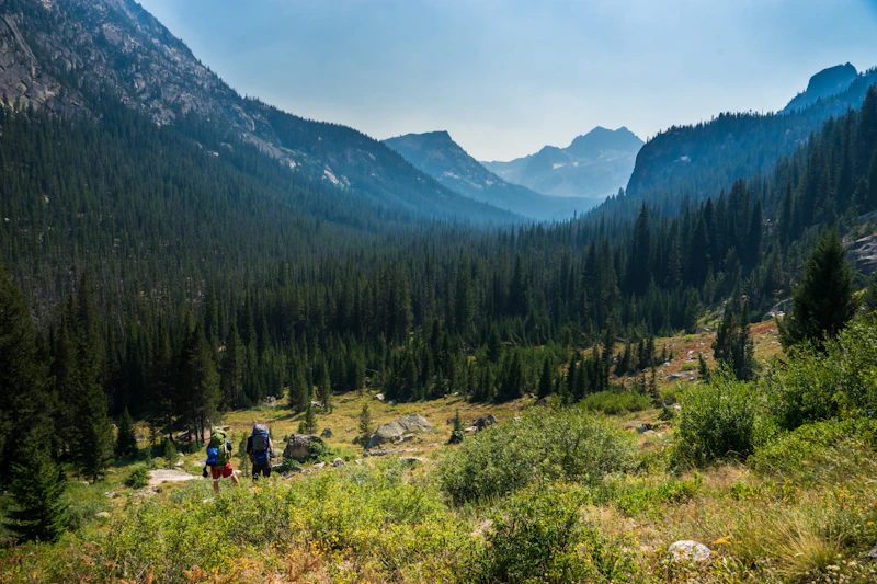 Backpacking through a mountain valley.