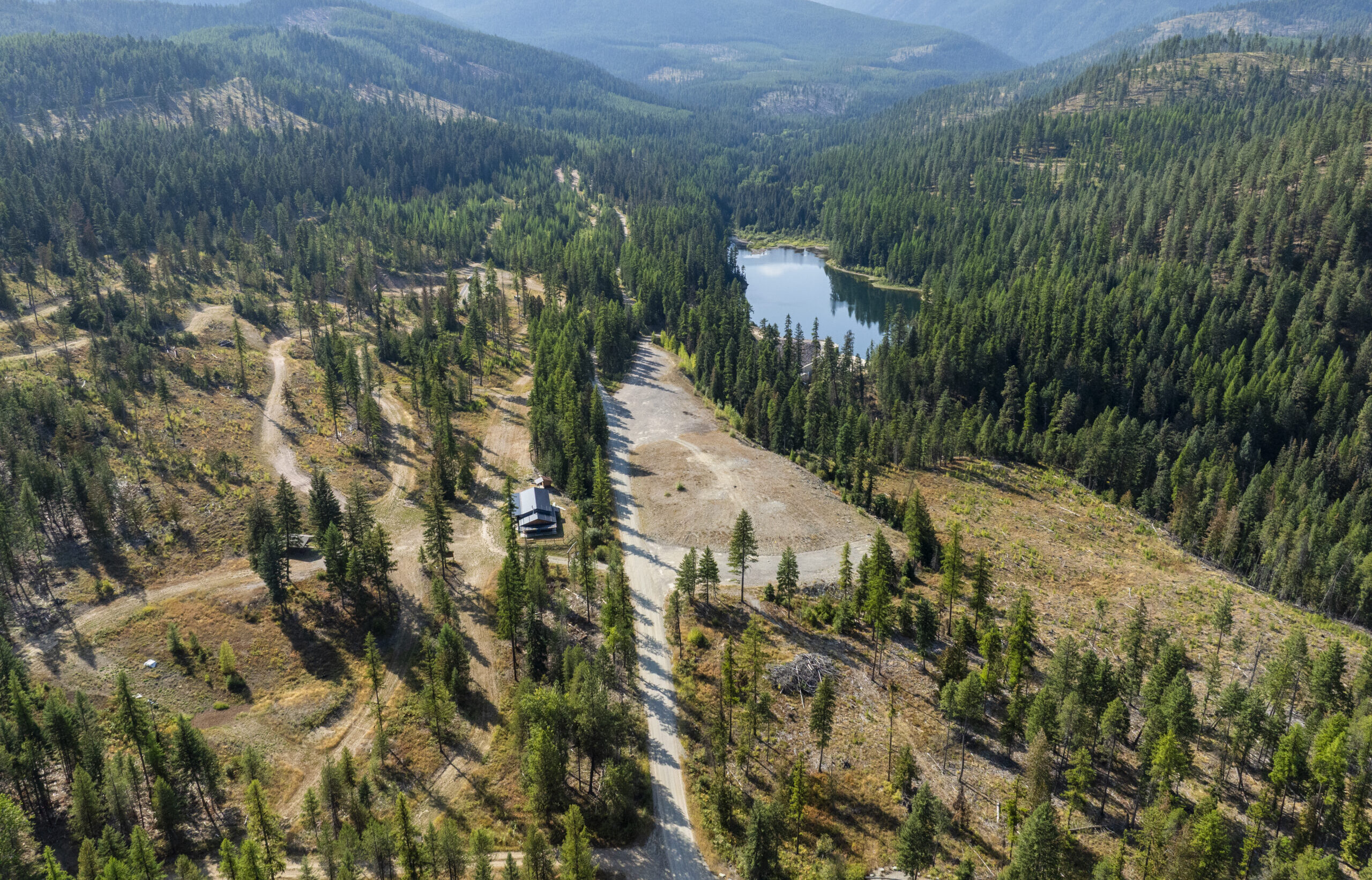 Isolated cabin surrounded by forests in the northern Rockies.