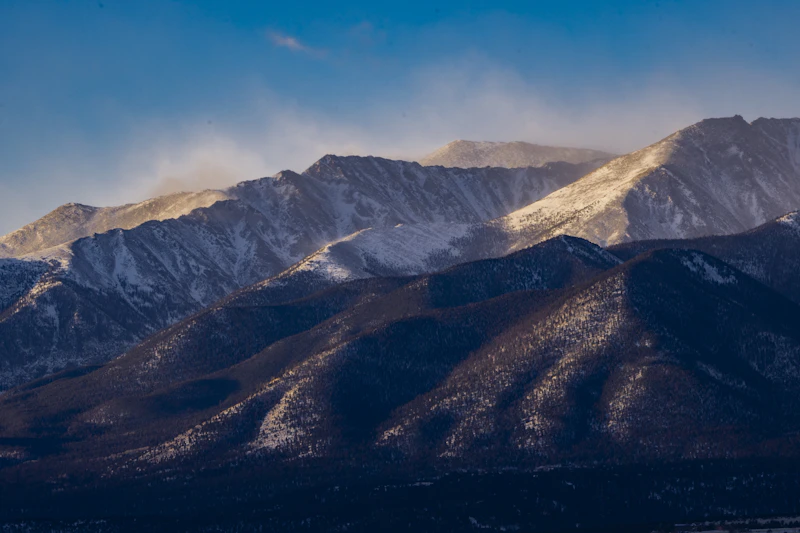 Morning mist off snowy mountains.