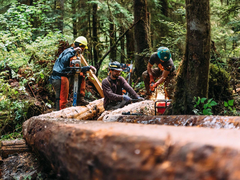 Earth Corps doing trail work at Lake 22; project supported by REI
